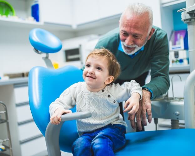 Young patient smiling during first children's dentistry visit