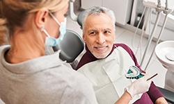 A man getting dental impressions for dentures