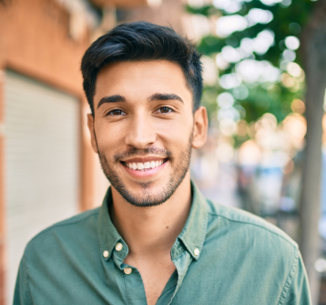 Man with healthy smile thanks to restorative dentistry