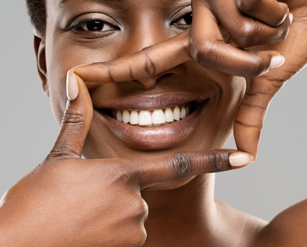 Dental patient enjoying the benefits of professional teeth whitening