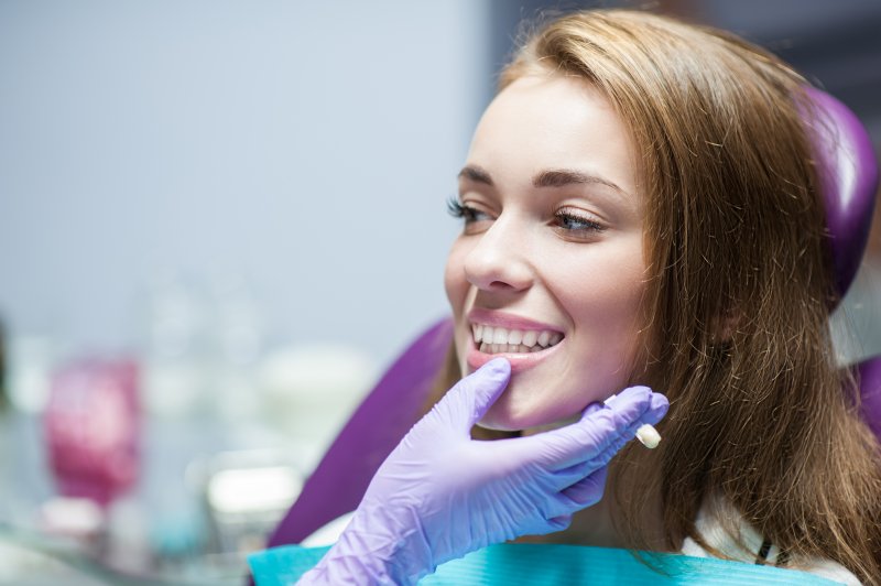 patient smiling in dental chair