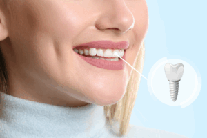 a patient with a dental implant smiling