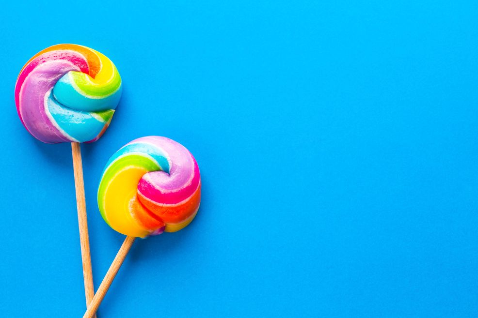 Two rainbow lollipops